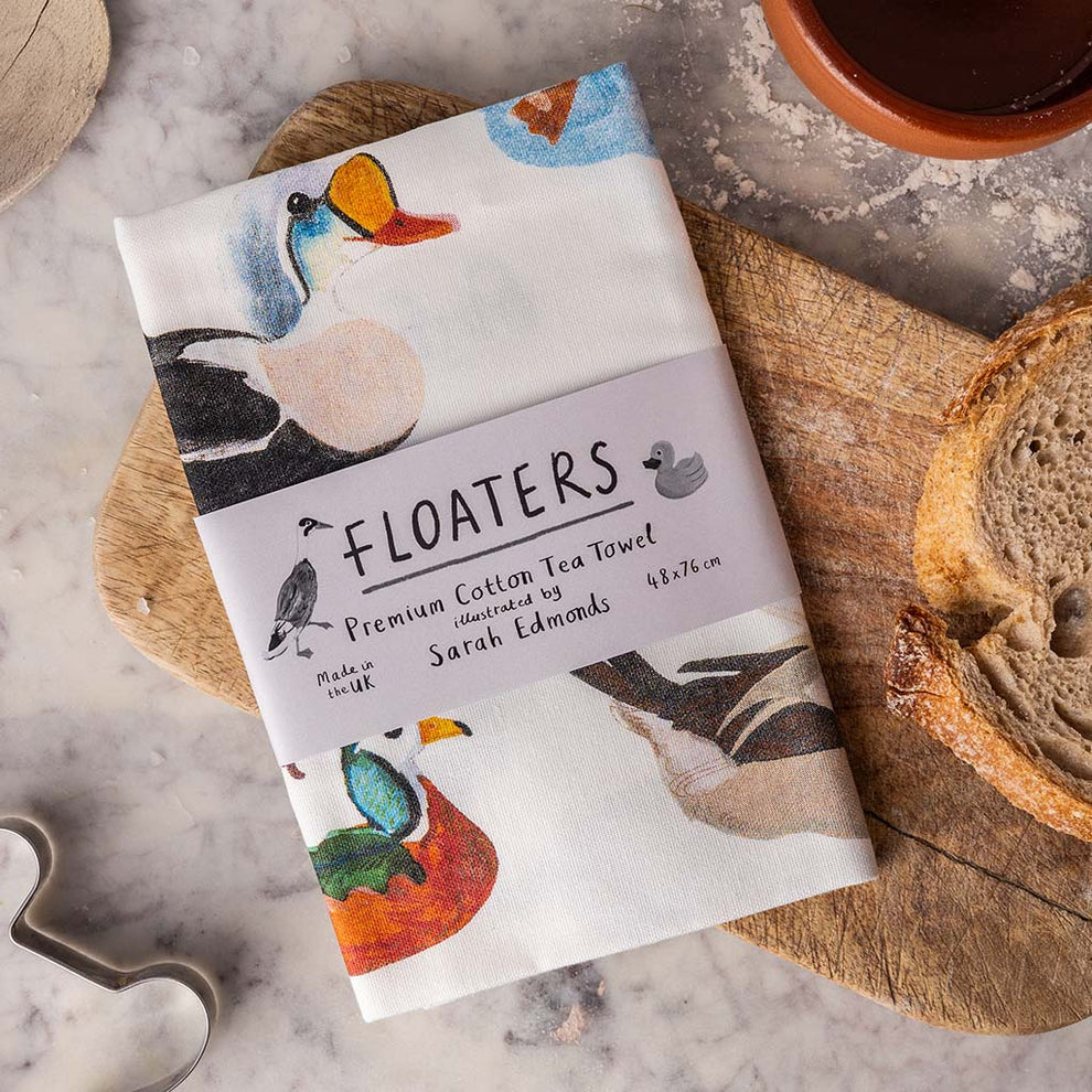 Floaters Design Tea Towel