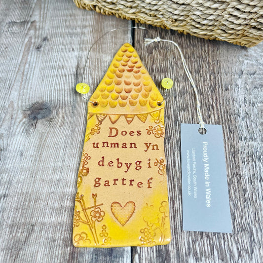 Yellow 'There's no place like home' Ceramic Wall Hanging