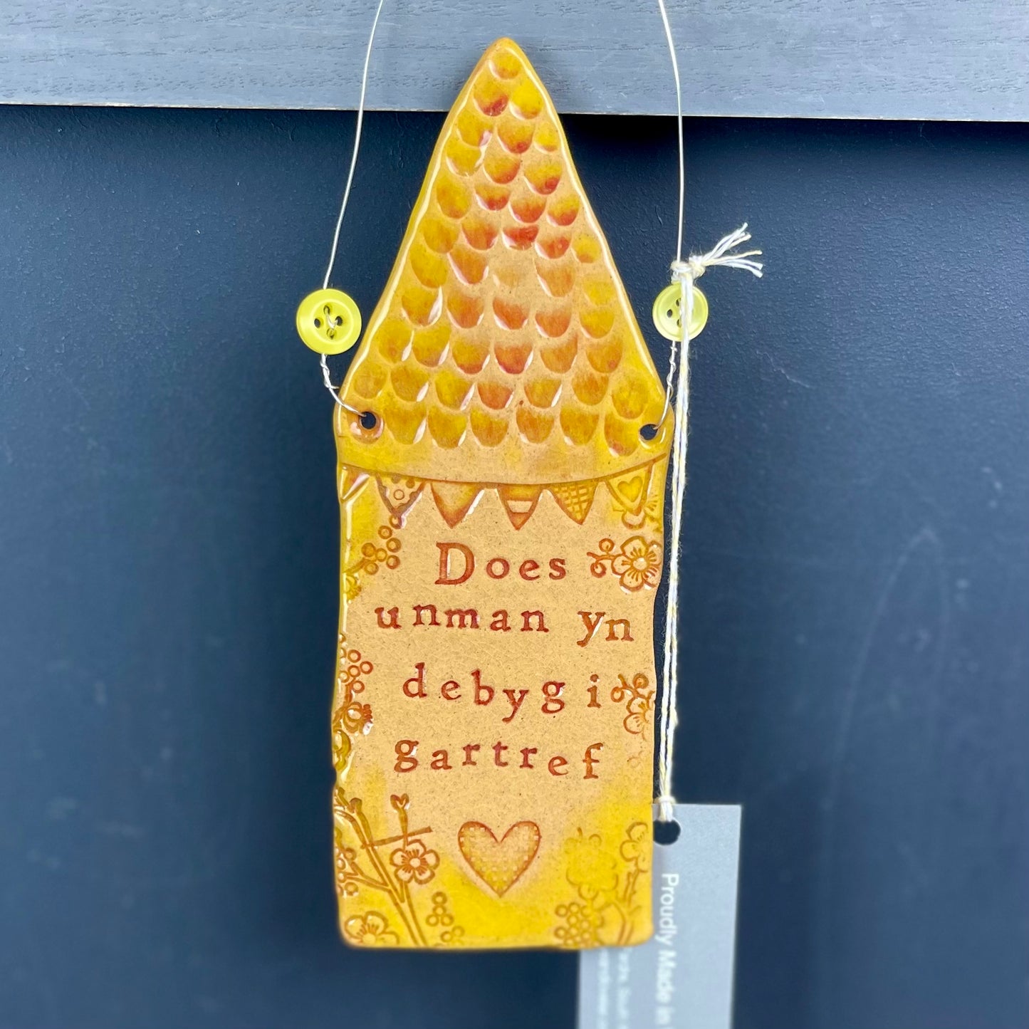 Yellow 'There's no place like home' Ceramic Wall Hanging