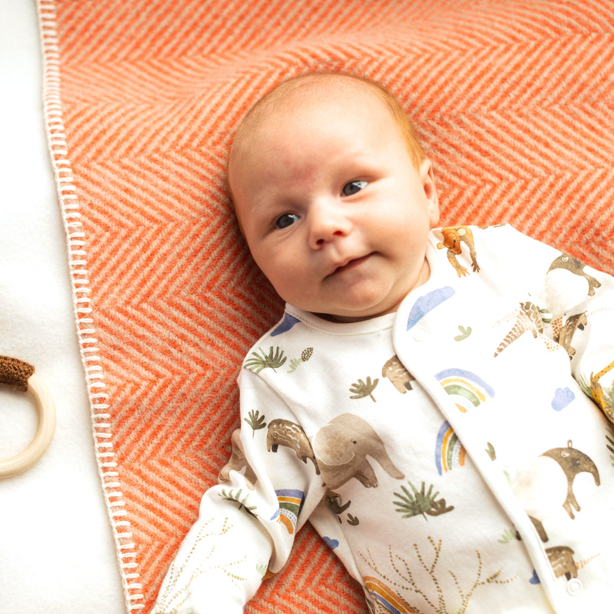 Flamingo and Pearl Herringbone Welsh Pram Blanket by Tweedmill